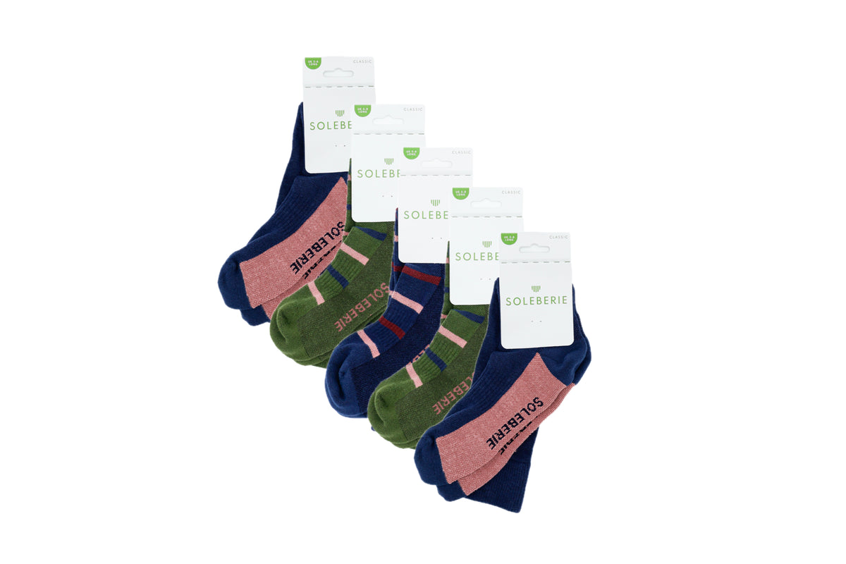 A set of five pairs of Soleberie Classic Long Socks arranged in a fan shape on a white background. The socks come in navy blue and green.