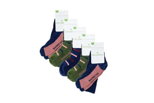 A set of five pairs of Soleberie Classic Long Socks arranged in a fan shape on a white background. The socks come in navy blue and green.